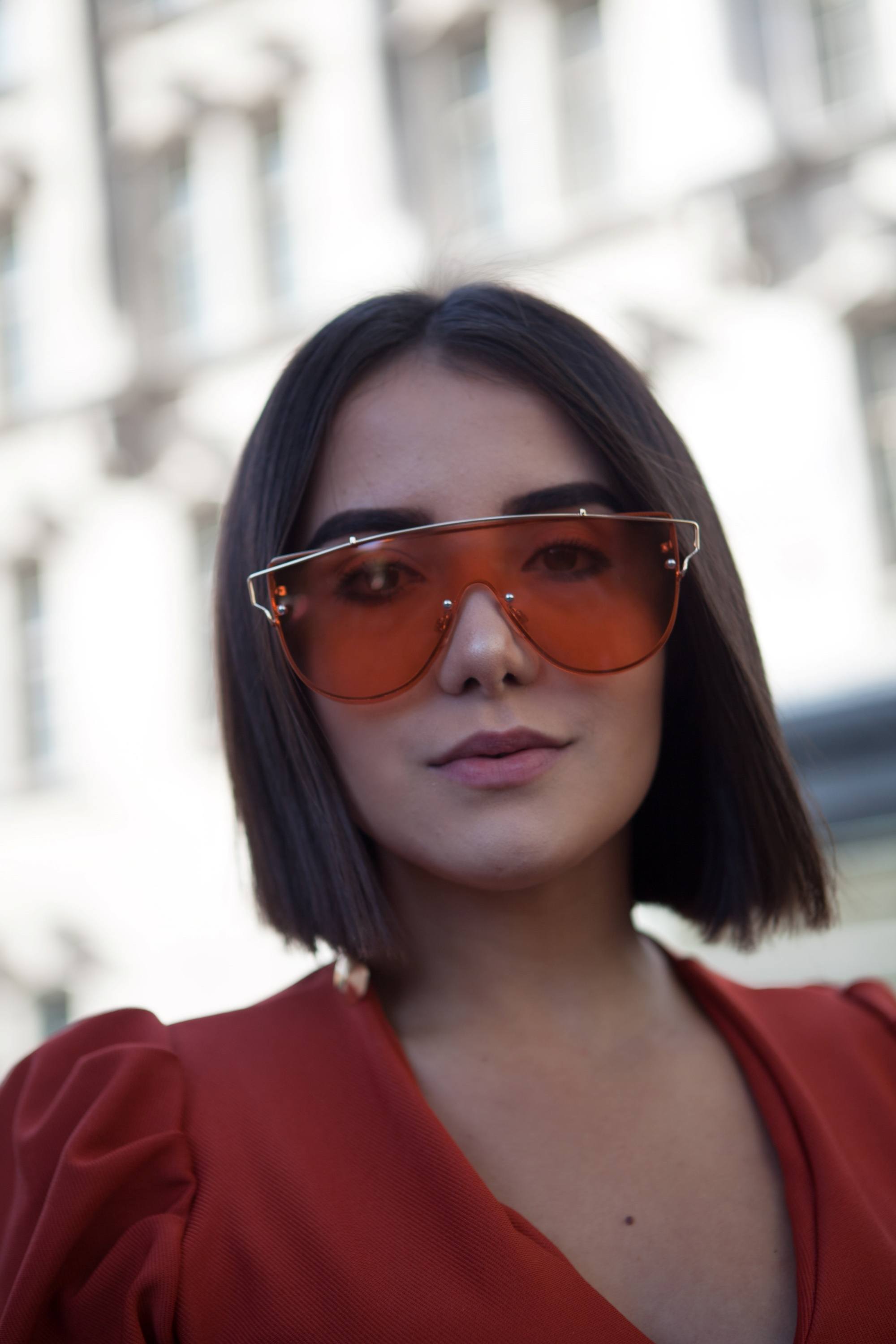 Woman with an A-line bob wearing sunglasses