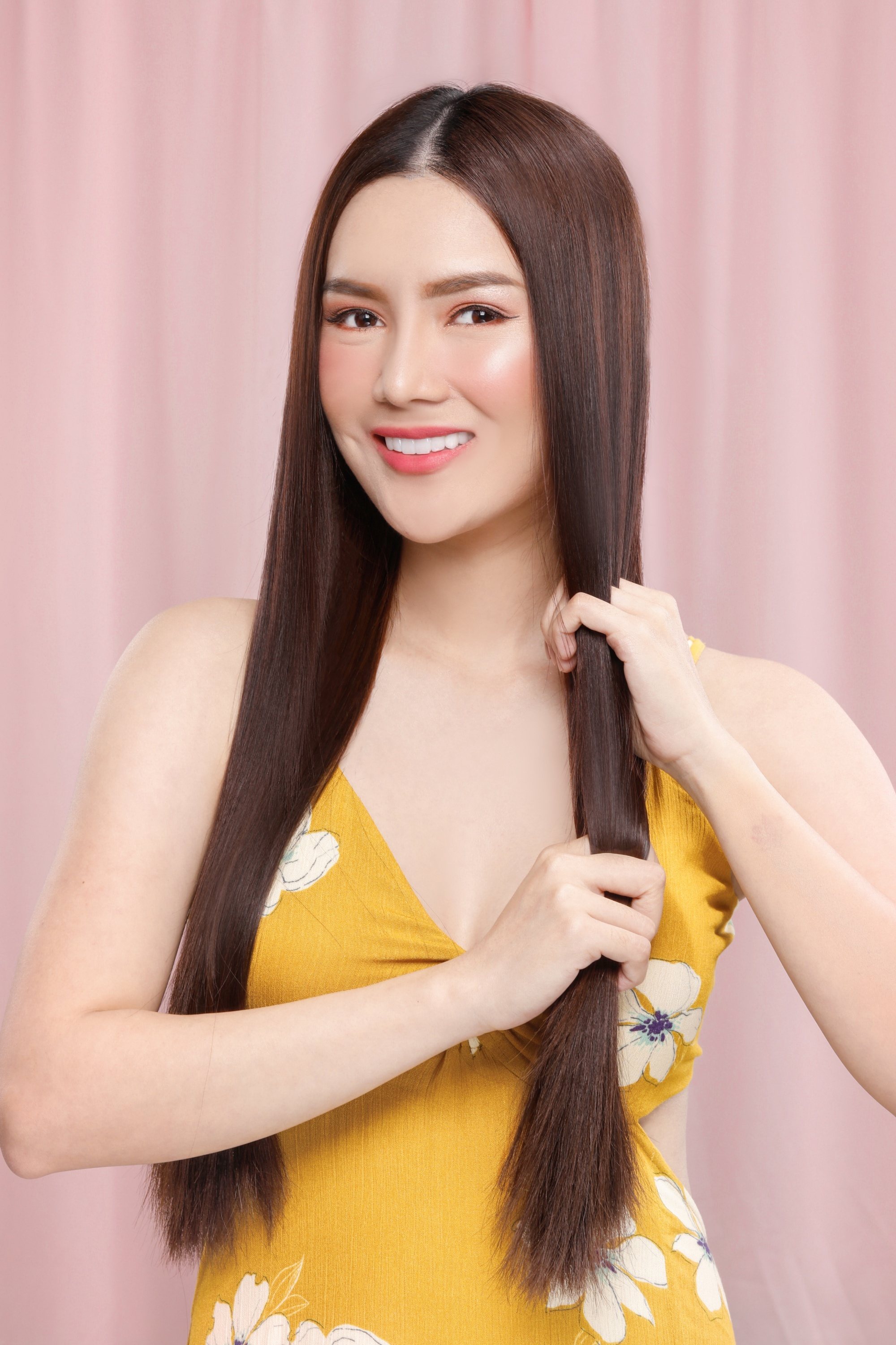 Asian woman with long hair that's free from split ends
