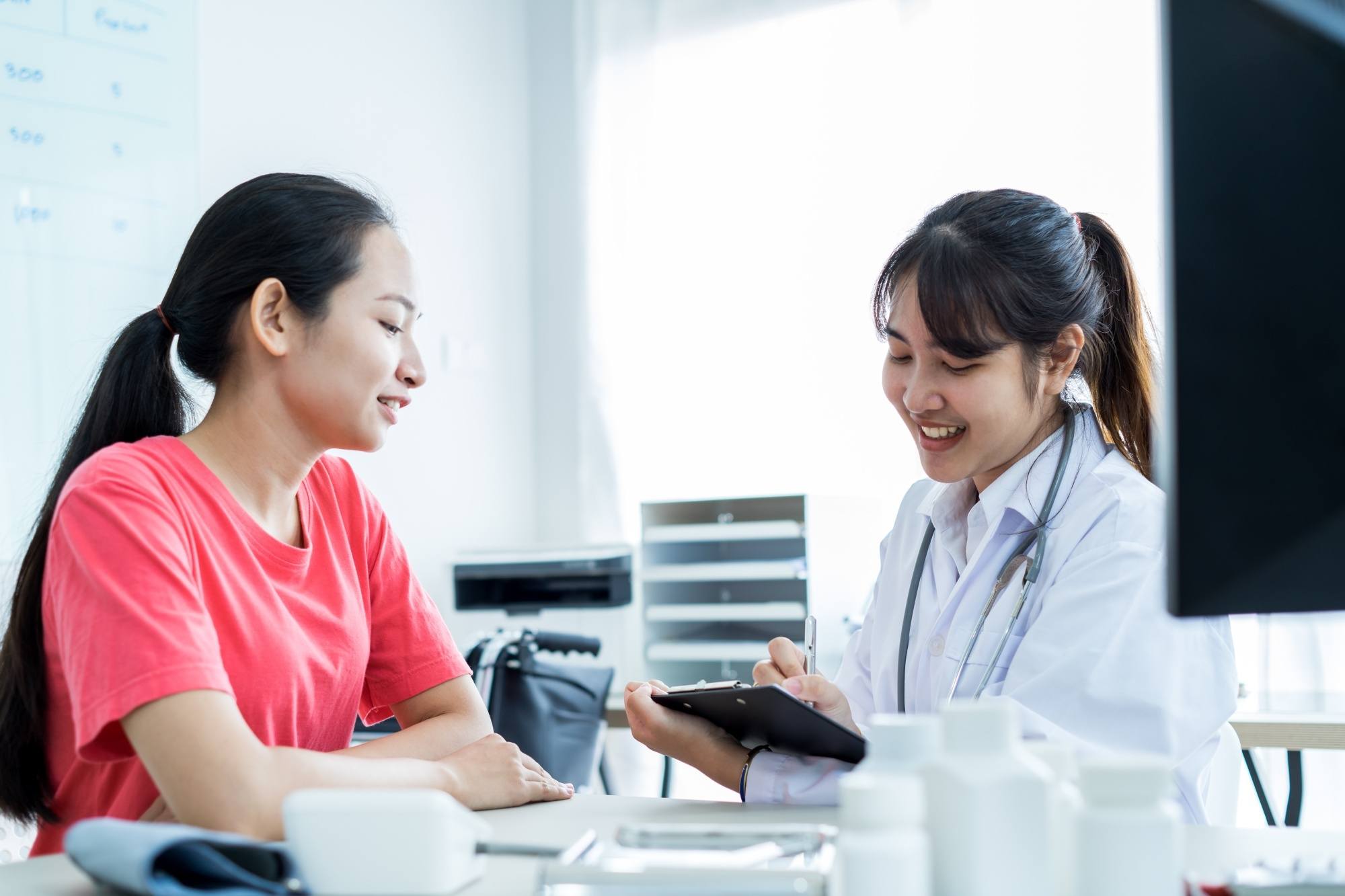 Asian woman consulting a doctor