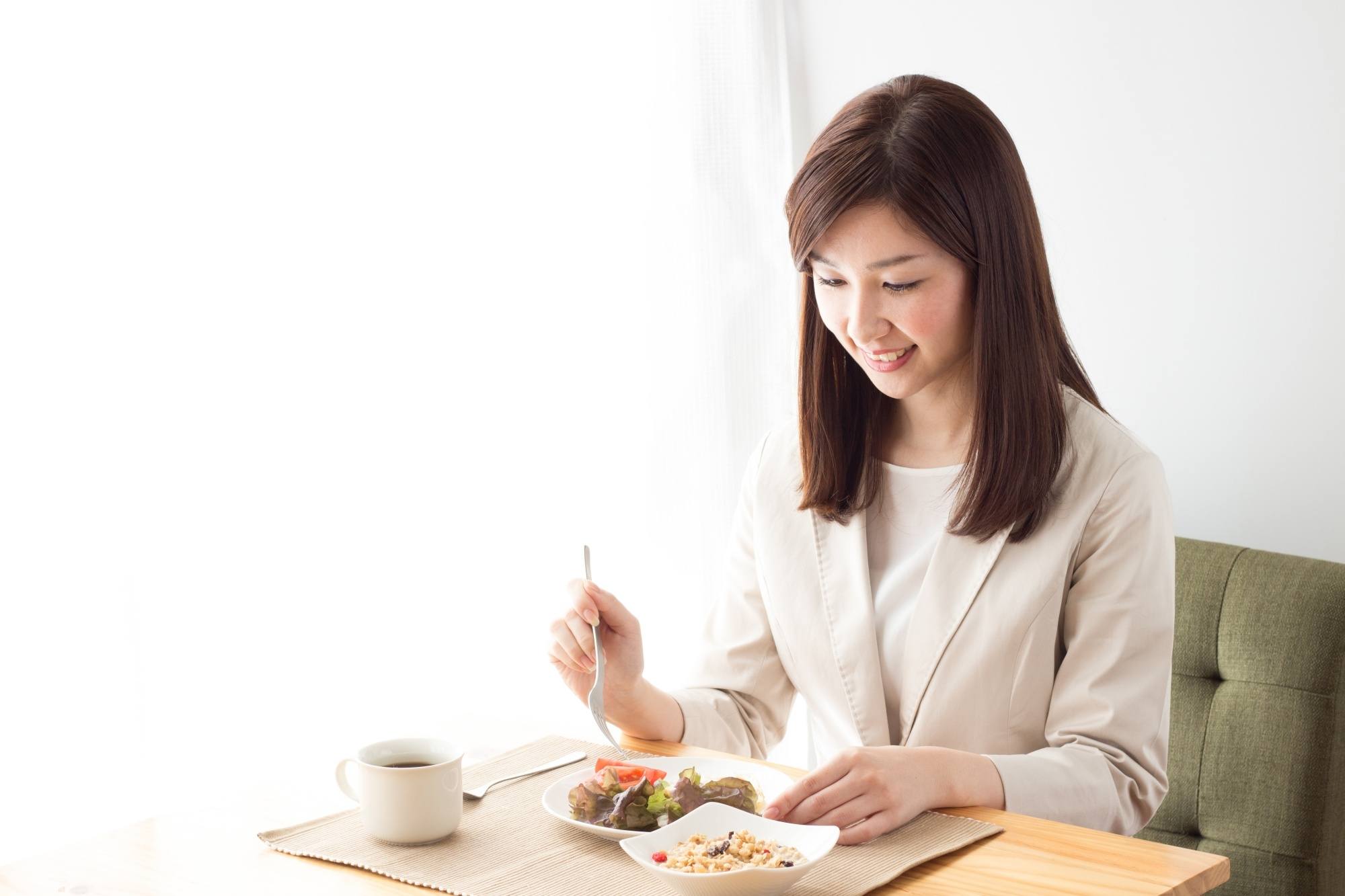 Asian woman eating healthy food