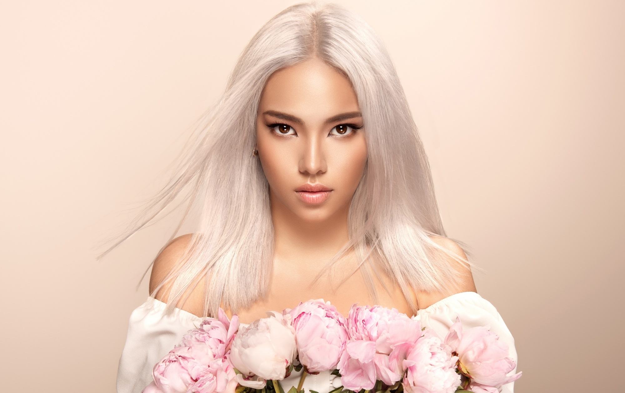 Hair Dye Ideas: Asian woman with platinum blonde hair