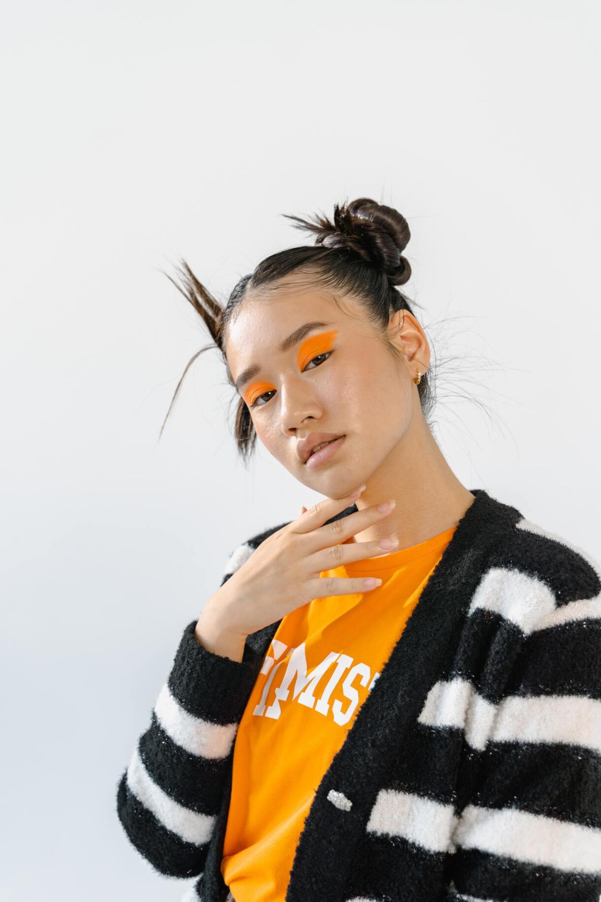 Woman wearing space bun hairstyle