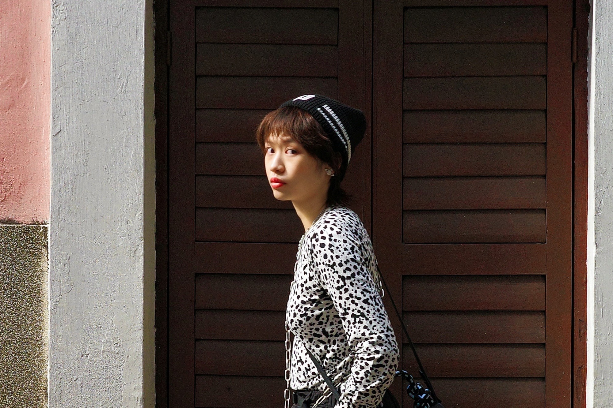 Asian woman with an androgynous hairstyle