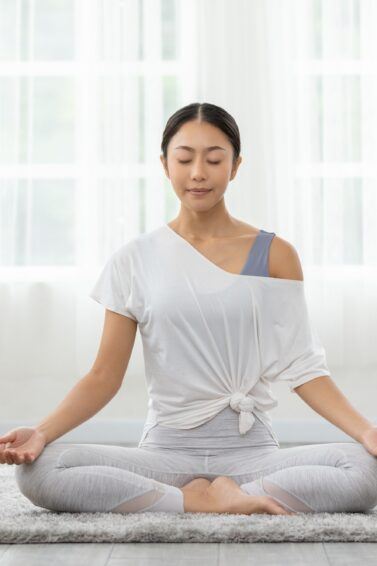 Asian woman doing yoga