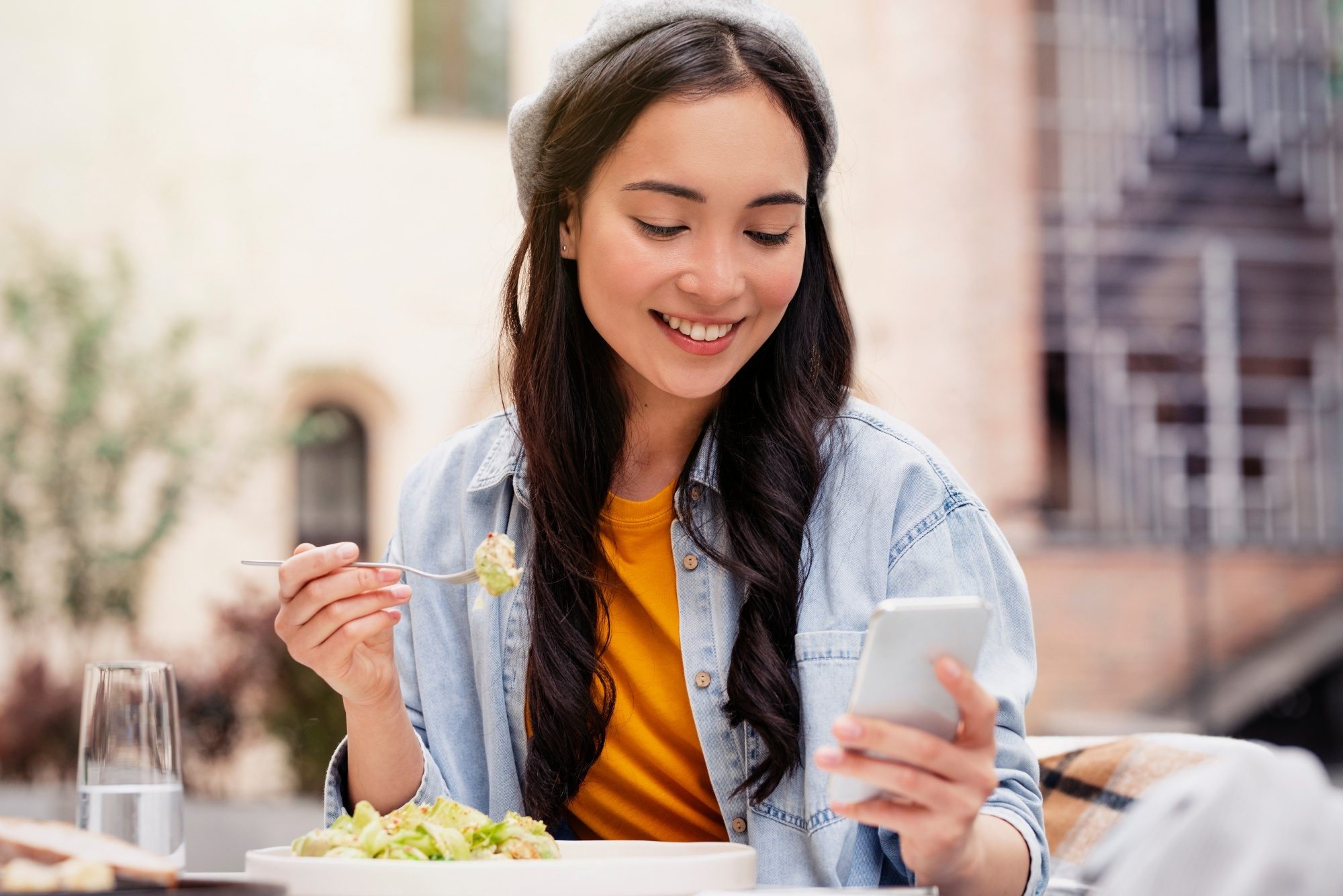 Asian woman eating a healthy diet to get vitamins for hair loss
