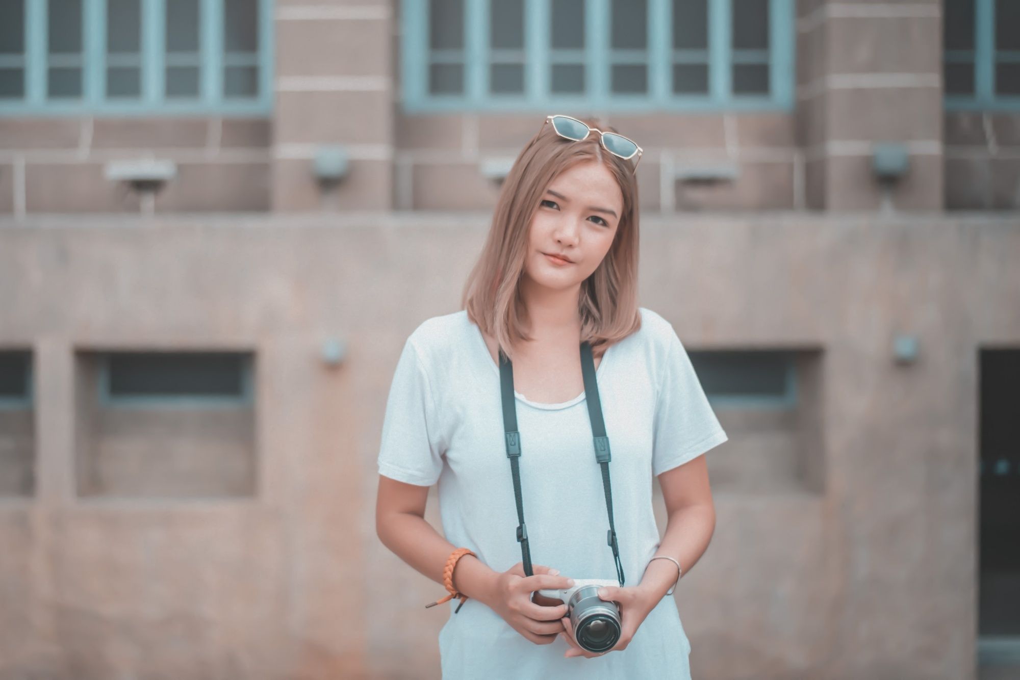Asian woman with milk tea latte ashy hairstyle