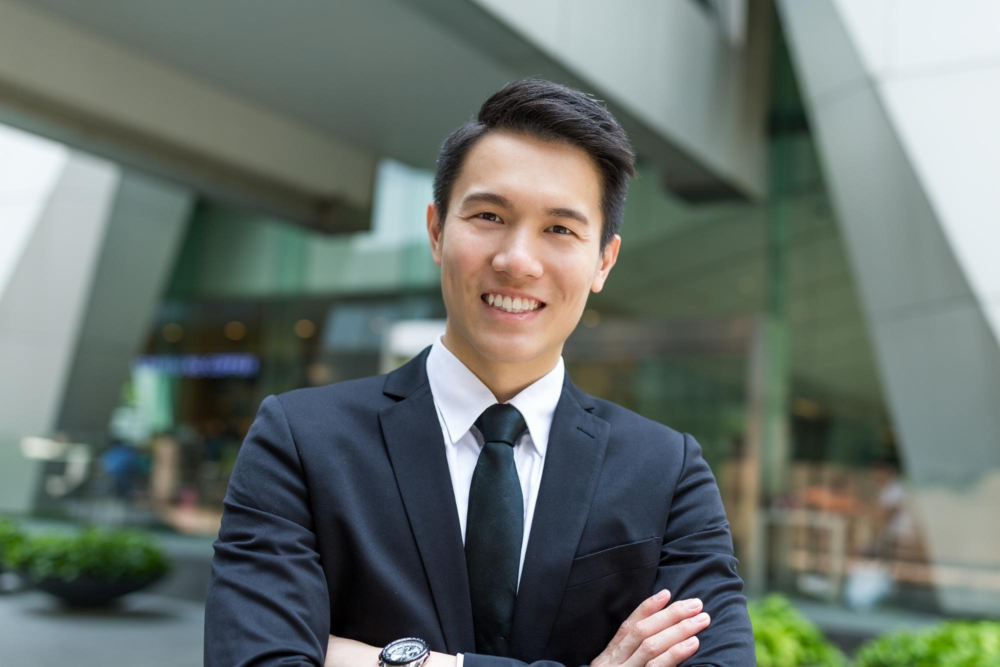 Asian businessman with a side swept undercut