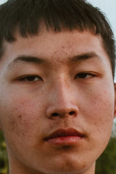 Asian man with a crop top haircut