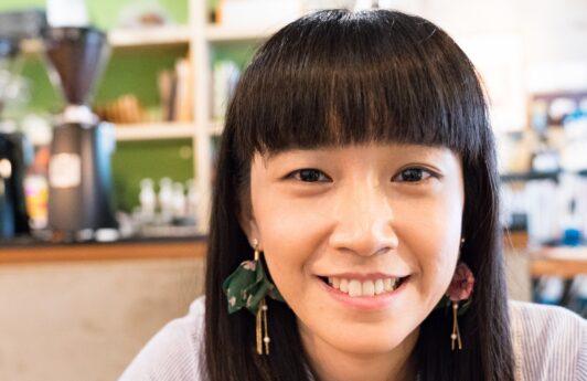 Asian woman with full bangs