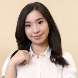 Asian woman with beautiful hair wearing a white blouse