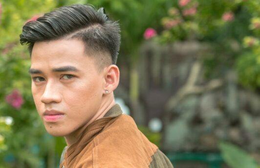 Asian man with a burst fade haircut