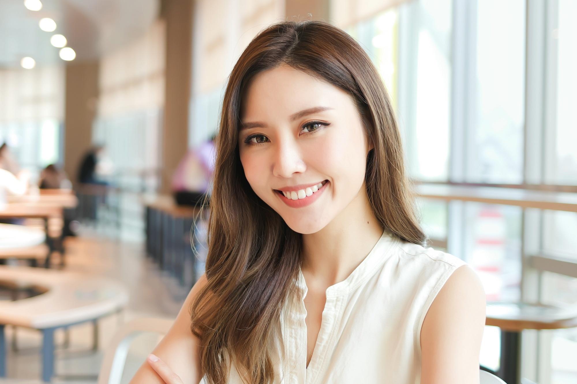 Asian woman with matcha chocolate hair color