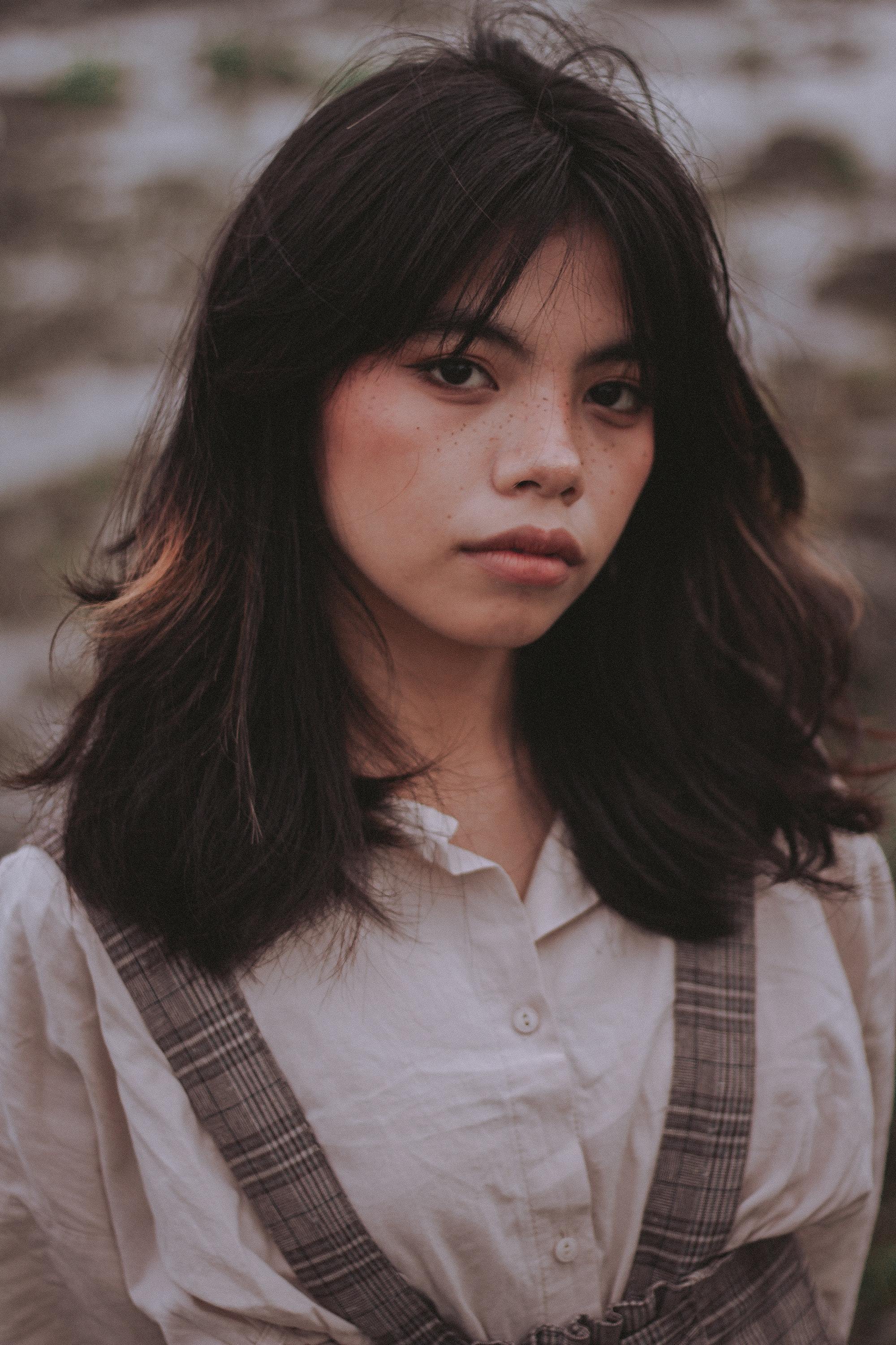 Woman with layered shoulder-length hair