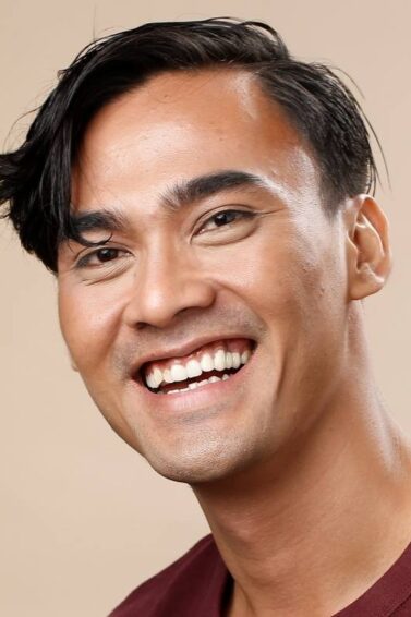 Asian man with short wavy hairstyle