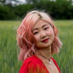 Asian woman with pink ombre short hair
